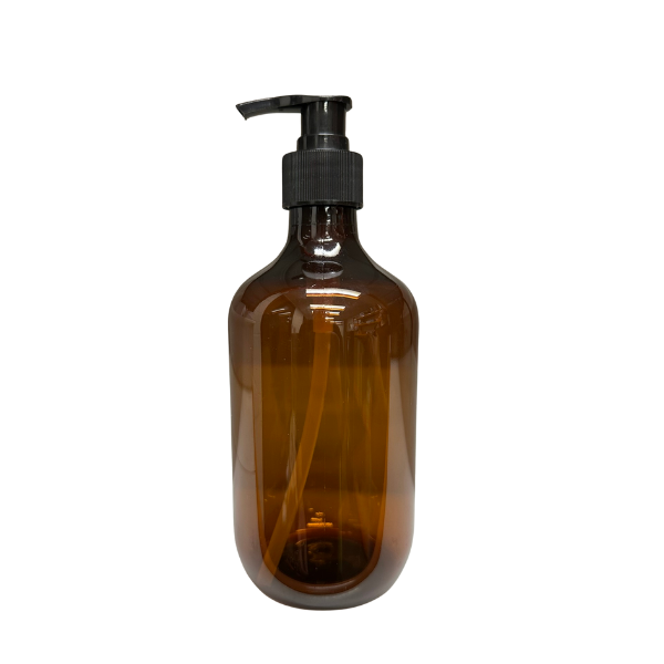 Brown glass bottle with black pump dispenser on a white background