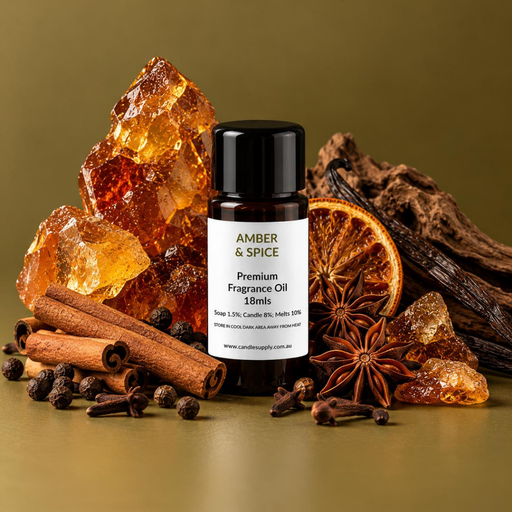 Amber & Spice fragrance oil bottle with amber-coloured chunks, cinnamon sticks, star anise, cloves, dried orange and wood.