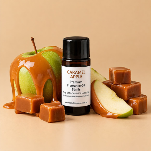 Caramel Apple fragrance oil bottle with a caramel-covered green apple, apple slices and caramel cubes.