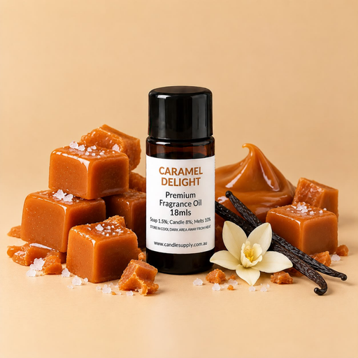 Caramel Delight fragrance oil bottle with salted caramel cubes, caramel swirls, vanilla pods and a white flower.