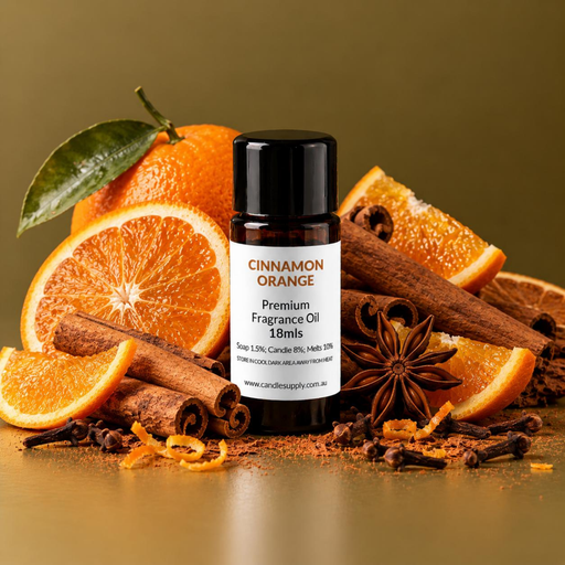 Cinnamon Orange fragrance oil bottle with whole and sliced oranges, cinnamon sticks, star anise, cloves and curled orange peel.