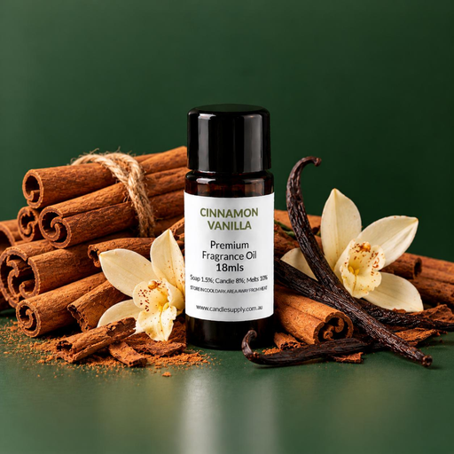 Cinnamon Vanilla fragrance oil bottle with stacked cinnamon sticks, dark vanilla pods, white vanilla flowers and ground spice.