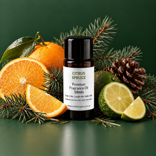Citrus Spruce fragrance oil bottle with orange slices, whole and halved lime, evergreen sprigs and a pine cone.
