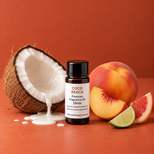 Coco Beach fragrance oil bottle with a coconut half, peach slices, lime and pink grapefruit wedges.
