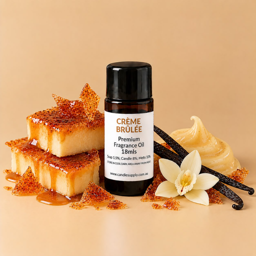 Crème Brûlée fragrance oil bottle with caramel-topped custard squares, caramel shards, vanilla pods and a white flower.