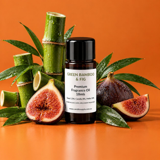 Green Bamboo & Fig fragrance oil bottle with cut green bamboo stems, leafy branches and whole and halved purple figs.