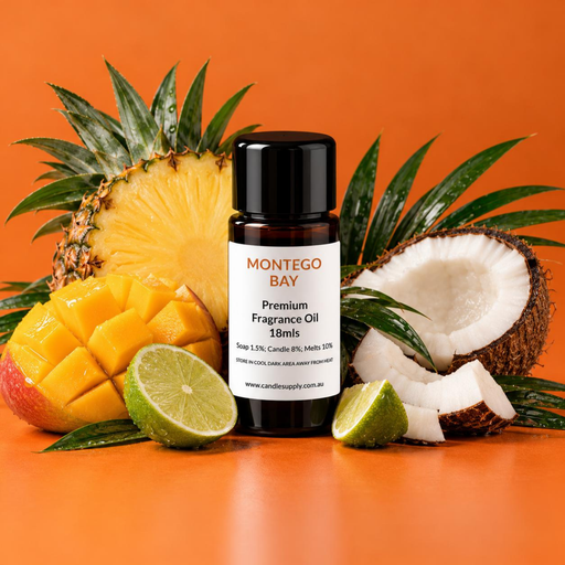 Montego Bay fragrance oil bottle with a pineapple half, mango, coconut pieces, lime halves and tropical leaves.