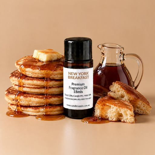 New York Breakfast fragrance oil bottle with butter-topped pancakes, a jug of syrup and golden cake pieces.