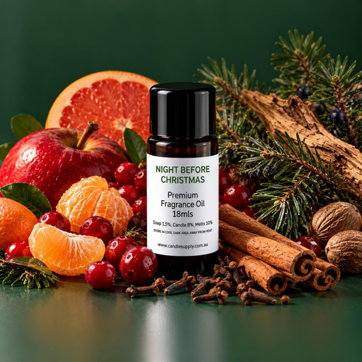 Night Before Christmas fragrance oil bottle with apple, citrus, cranberries, cinnamon sticks, cloves, nutmeg and evergreen branches.
