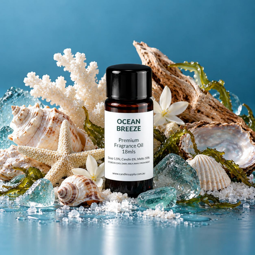 Ocean Breeze fragrance oil bottle with seashells, a starfish, white coral, driftwood, seaweed and blue glass-like pieces on a wet surface.