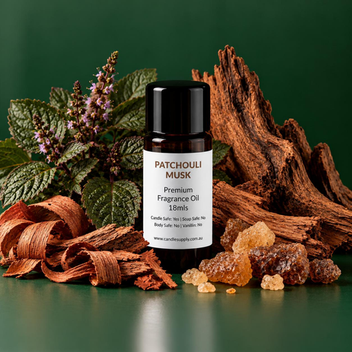 Patchouli Musk fragrance oil bottle with textured green leaves, purple flower spikes, rough wood, curled wood shavings and resin pieces.