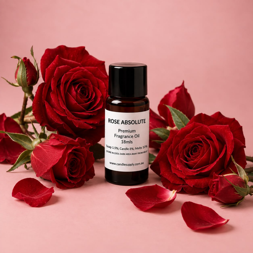 Rose Absolute fragrance oil bottle with deep red roses, rosebuds, green leaves and scattered red petals.