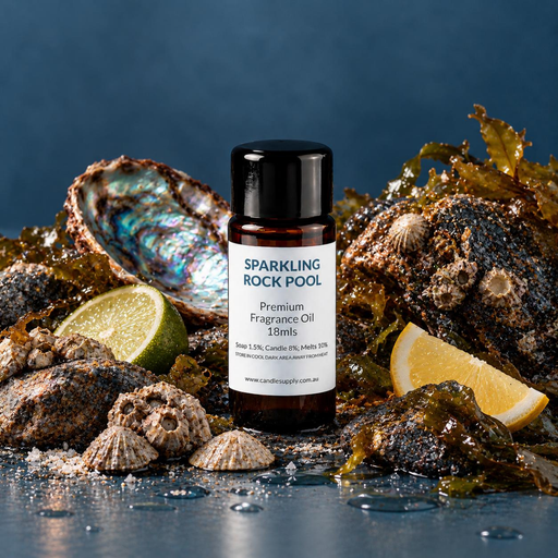 Sparkling Rock Pool fragrance oil bottle with wet rocks, seashells, seaweed, an iridescent shell and lime and lemon wedges.