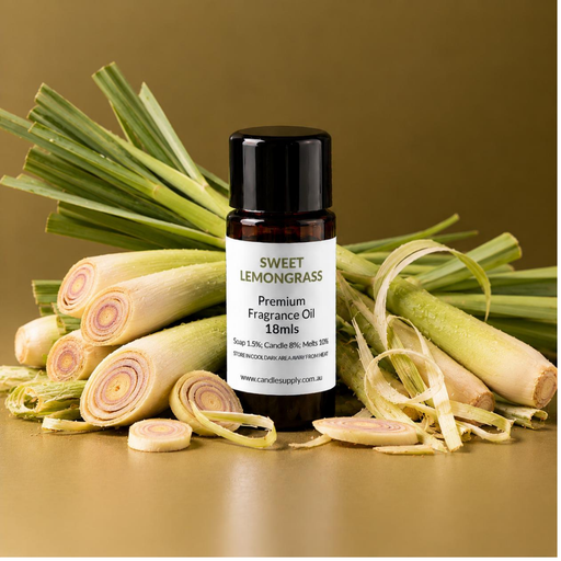 Sweet Lemongrass fragrance oil bottle with fresh lemongrass stalks, cut rounds and curled strips of lemongrass.