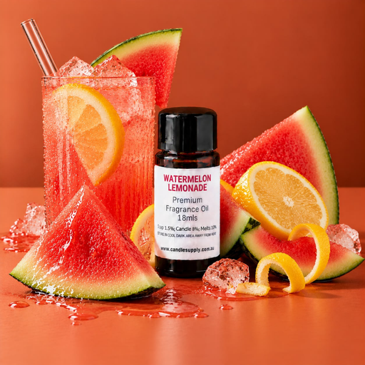 Watermelon Lemonade fragrance oil bottle with a pink iced drink, watermelon wedges, lemon slices, curled lemon peel and ice cubes.